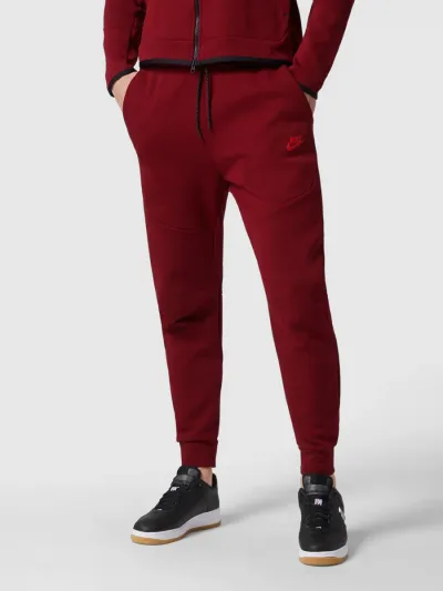 Nike Nike Spodnie dresowe o kroju regular fit z nadrukiem z logo