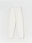 Wygodne spodnie dresowe uszyte z materiału z dodatkiem bawełny. - kremowy
