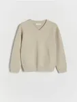 Sweter o klasycznym fasonie, wykonany ze strukturalnej dzianiny z bawełną. - beżowy