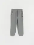 Dresowe spodnie typu jogger, wykonane z miękkiej dzianiny z bawełną. - ciemnoszary