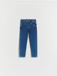 Jeansy typu slim, wykonane z tkaniny z bawełną. - niebieski