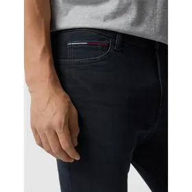 Tommy Jeans Jeansy o kroju slim fit z detalami z logo model ‘Simon’