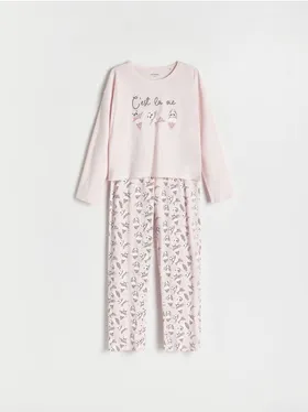 Piżama składająca się z koszulki i spodni, uszyta z bawełny. - pastelowy róż