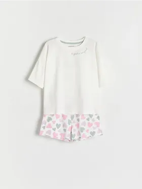 Piżama składająca się z t-shirtu i szortów, uszyta z bawełnianej dzianiny. - złamana biel
