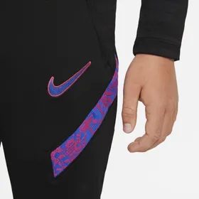 Spodnie piłkarskie dla dużych dzieci FC Barcelona Strike Nike Dri-FIT - Czerń