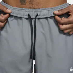 Męskie spodnie do biegania z tkaniny Nike Dri-FIT Challenger - Szary