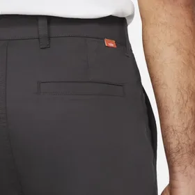 Męskie spodnie chino o dopasowanym kroju do golfa Nike Dri-FIT UV - Szary