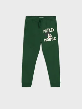 Wygodne spodnie dresowe jogger wykonane z miękkiej dzianiny. Ozdobione nadrukiem z Myszką Miki. - zielony