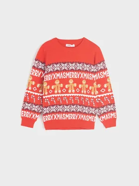 Wygodny sweter wykonany z miękkiej, bawełnianej dzianiny. Świąteczny wzór na całości. - czerwony