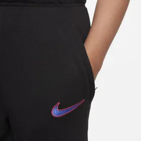 Spodnie piłkarskie z dzianiny dla dużych dzieci FC Barcelona Nike Dri-FIT - Czerń