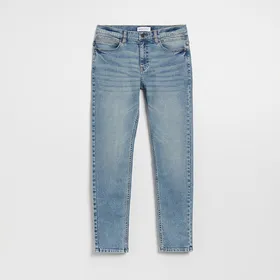 Jasnoniebieskie jeansy slim fit z efektem sprania - Niebieski