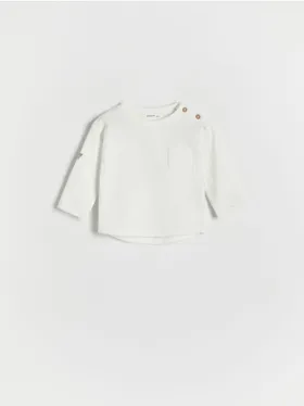 Koszulka longsleeve o swobodnym fasonie, wykonana z przyjemnej w dotyku, bawełnianej dzianiny. - złamana biel