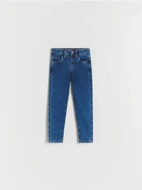 Jeansy typu slim, wykonane z tkaniny z bawełną. - niebieski