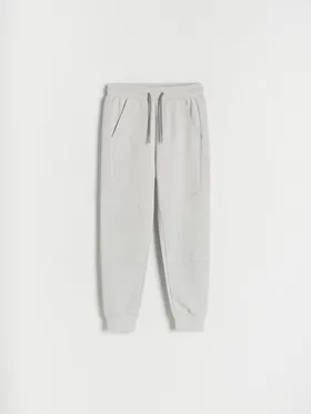 Spodnie typu jogger, wykonane z dresowej, bawełnianej dzianiny. - jasnoszary