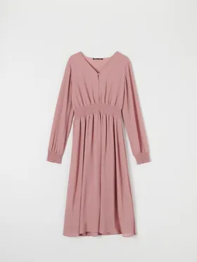 Elegancka sukienka o rozkloszowanym kroju uszyta z szybkoschnącego materiału. - różowy