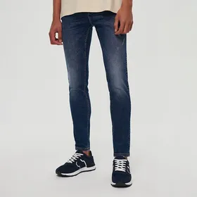 Granatowe jeansy skinny fit - Granatowy