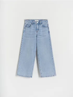 Spodnie typu wide leg, uszyte z bawełnianej tkaniny jeansowej. - niebieski