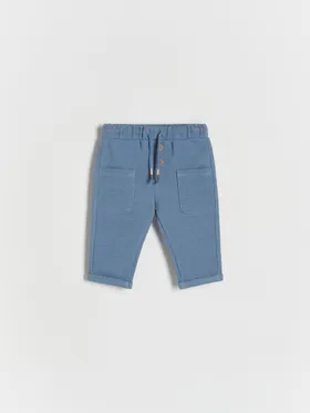 Spodnie o prostym fasonie, wykonane z przyjemnej w dotyku dzianiny z bawełną. - niebieski