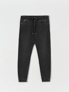 Jeansy o kroju jogger fit, wykonane z bawełny z dodatkiem elastycznych włókien. - szary