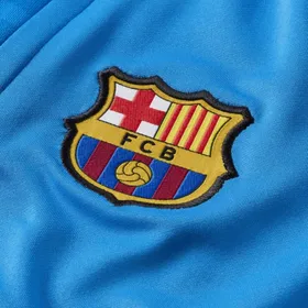 Męskie dzianinowe spodnie piłkarskie Nike Dri-FIT FC Barcelona Strike - Niebieski