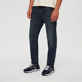 Granatowe jeansy slim fit - Niebieski