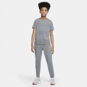 Spodnie treningowe z tkaniny dla dużych dzieci (chłopców) Nike Dri-FIT - Szary