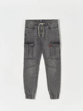 Wygodne jeansy cargo slim jogger uszyte z bawełny z dodatkiem elastycznych włókien. - szary
