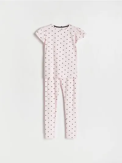 Reserved Piżama składająca się z t-shirtu i spodni, uszyta z bawełny. - pastelowy róż