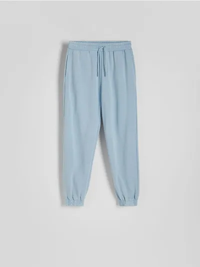 Reserved Spodnie o swobodnym fasonie, wykonane z bawełnianej dzianiny. - jasnoniebieski