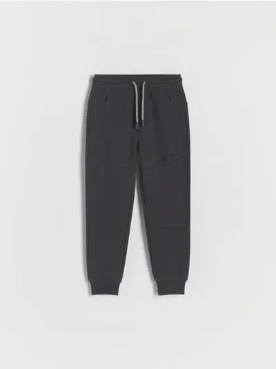Reserved Dresowe spodnie typu jogger, wykonane z bawełnianej dzianiny typu pique. - ciemnoszary
