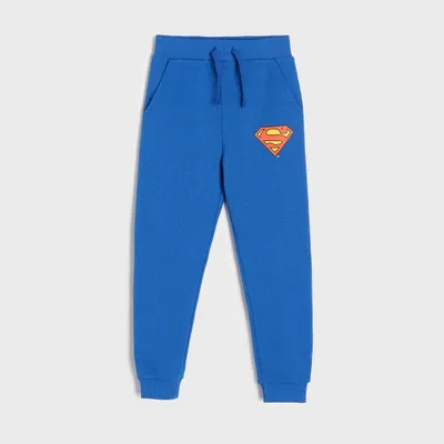 Sinsay Spodnie dresowe jogger Superman - Niebieski