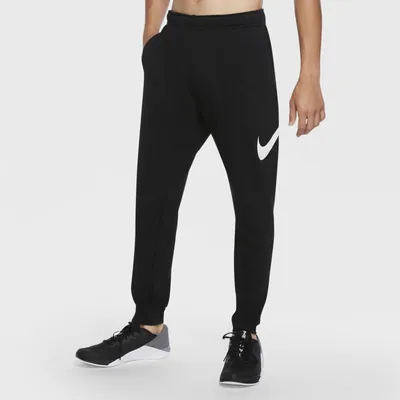 Nike Męskie spodnie treningowe o zwężanym kroju Nike Dri-FIT - Czerń