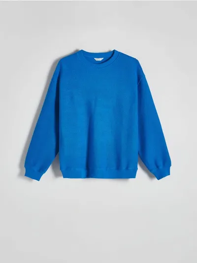 Reserved Bluza o swobodnym fasonie z kolekcji PREMIUM, wykonana z bawełnianej dzianiny. - niebieski