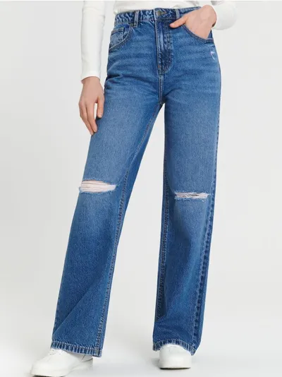 Sinsay Spodnie jeansowe o kroju wide leg uszyte z bawełny z ozdobnymi przetarciami na nogawkach. - granatowy