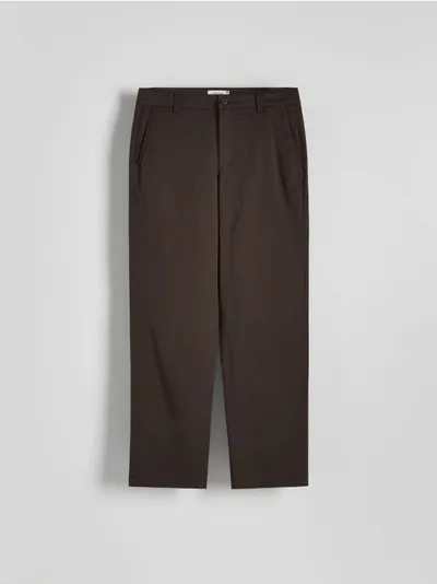 Reserved Spodnie typu chino o regularnym fasonie, uszyte z gładkiej, bawełnianej tkaniny. - ciemnobrązowy