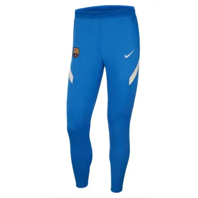 Nike Męskie dzianinowe spodnie piłkarskie Nike Dri-FIT FC Barcelona Strike - Niebieski