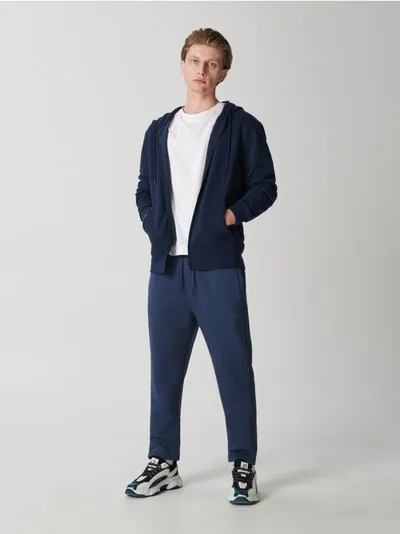 Sinsay Bawełniane spodnie o kroju jogger. - niebieski