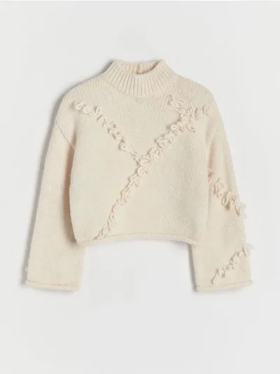 Reserved Sweter o luźnym kroju, wykonany z dzianiny. - złamana biel