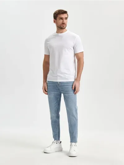 Sinsay Spodnie jeansowe z surowym wykończeniem nogawek, uszyte z bawełny z domieszką elastycznych włókien. - niebieski