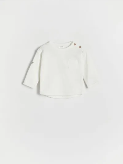 Reserved Koszulka longsleeve o swobodnym fasonie, wykonana z przyjemnej w dotyku, bawełnianej dzianiny. - złamana biel