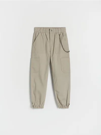 Reserved Spodnie typu jogger, wykonane z bawełnianej tkaniny. - zielony