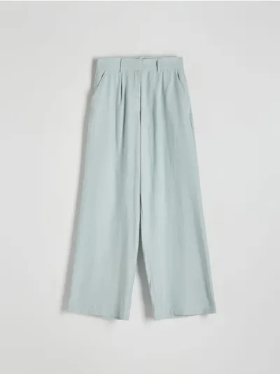 Reserved Spodnie o swobodnym fasonie, wykonane z tkaniny z modalu. - jasnozielony