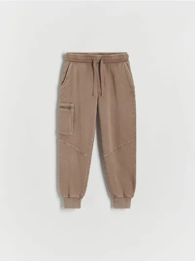 Reserved Spodnie typu jogger, wykonane z przyjemnej w dotyku, bawełnianej dzianiny. - brązowy