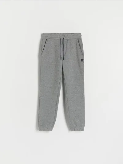 Reserved Dresowe spodnie typu jogger, wykonane z miękkiej dzianiny z bawełną. - ciemnoszary