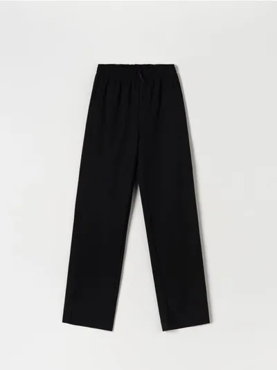 Sinsay Spodnie materiałowe z wysokim stanem wykonane z szybkoschnącego materiału z dodatkiem elastycznych włókien. - czarny