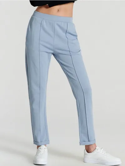 Sinsay Proste spodnie z przeszyciami wykonane z bawełny z dodoatkiem szybkoschnącego materiału. - niebieski
