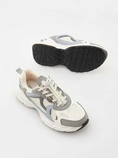 Reserved Sportowe buty typu sneakers, wykonane z łączonych materiałów. - złamana biel