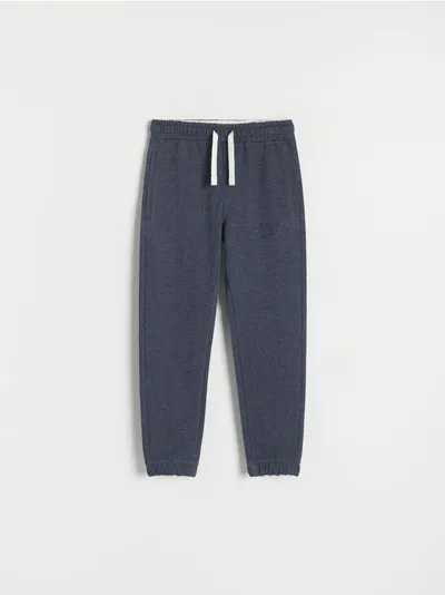 Reserved Spodnie typy jogger, wykonane z bawełnianej dzianiny dresowej. - granatowy