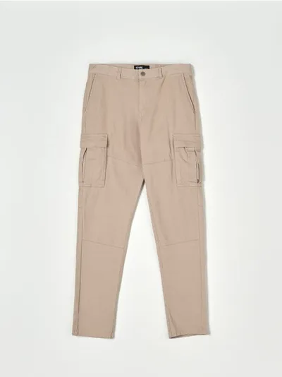 Sinsay Spodnie slim cargo wykonane z bawełny z dodatkiem elastycznych włókien. - beżowy