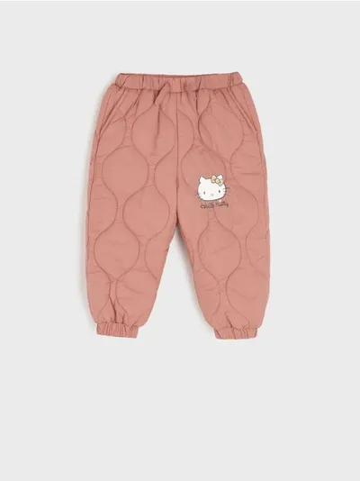 Pikowane spodnie z nadrukiem Hello Kitty. - różowy